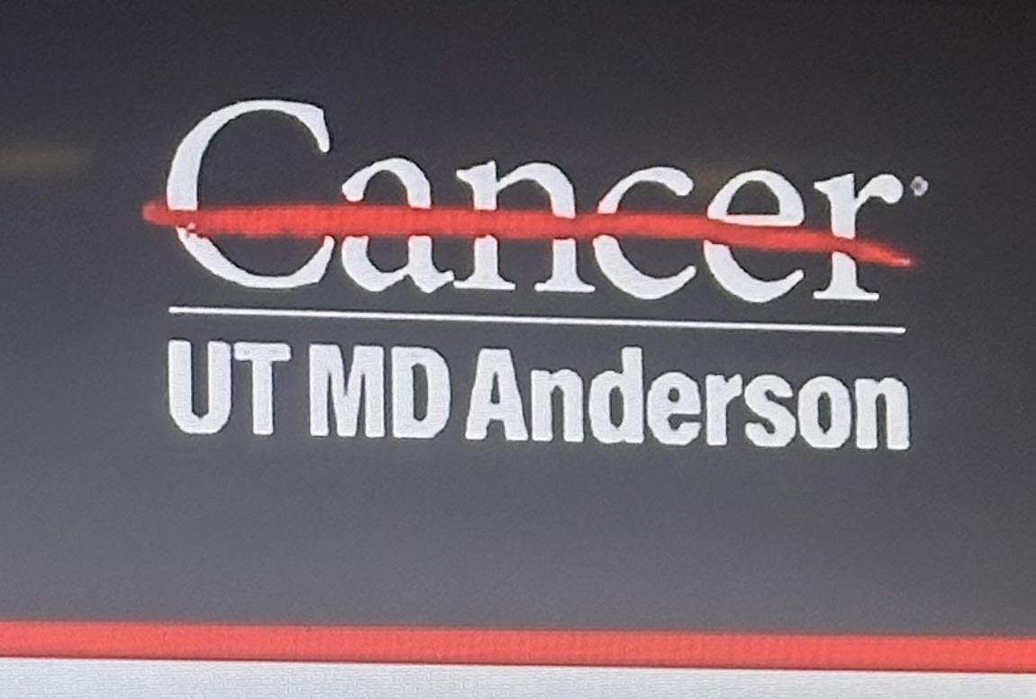 The MD Anderson logo with a red line striking through the word Cancer